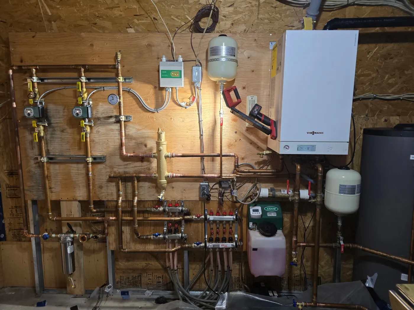 Commercial boiler plant with copper manifold installed by Rhino Plumbing