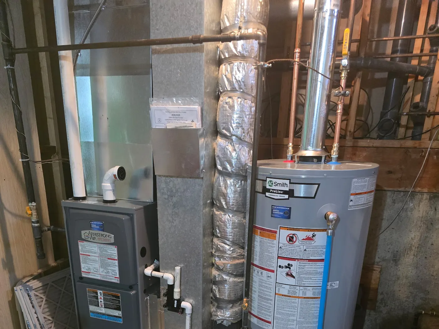 Furnace and hot water tank installed by Rhino Plumbing